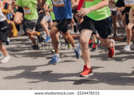 Similar – Foto Bild Sportler laufen auf Asphaltstrasse in den Bergen