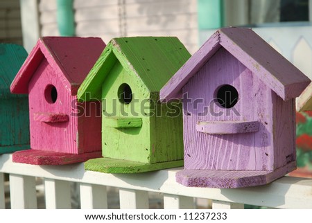 Hand Crafted Birdhouses Are Painted With Pastel Colors. Stock Photo ...