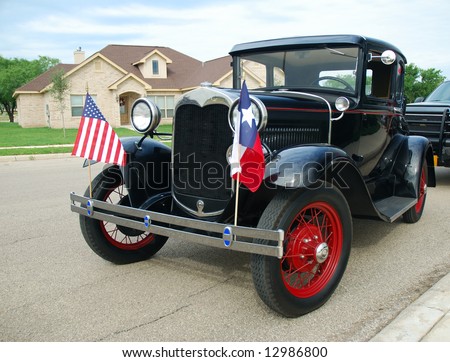 Classic coupe is designated as lead car in the parade.