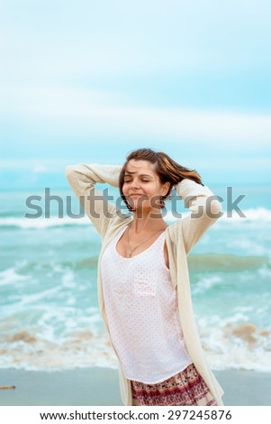 girl on the beach, happy and free, relaxation and freedom. Relax on the beach