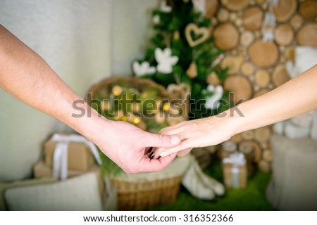 Hands of man and woman holding together. two hands together