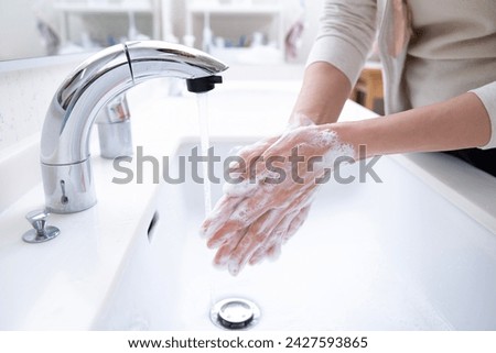 Similar – Image, Stock Photo Woman washing her hands