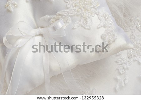 Wedding satin pillow on a lace background