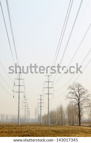 high voltage electric power steel tube tower under the blue sky