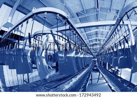 Steel shovel production line in a manufacturing enterprise, on December 20, 2013, tangshan city, hebei province, China.