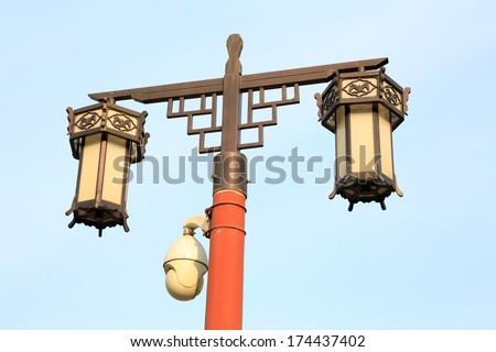 traditional style of lighting equipment and modern monitoring equipment in the Jingshan Park, beijing, china