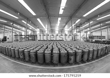 TANGSHAN - DECEMBER 22: The pressure tank put in a warehouse workshop, in a solar equipment production workshop on december 22, 2013, tangshan, china.