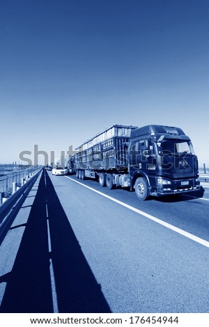 TIANJIN - DECEMBER 9: Heavy duty trucks were stopped on the highway Because of the traffic jam, on December 9, 2013, tianjin, China.