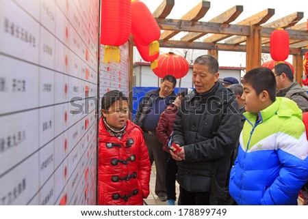 LUANNAN COUNTY - FEBRUARY 14: Spring Festival riddles scene during Chinese Lunar New Year, February 14, 2014, Luannan County, Hebei Province, China.