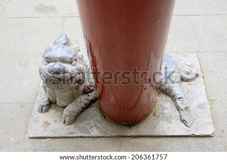 BEIJING - MAY 23: Animal sculptures and red pillars in the Beihai Park, on may 23, 2014, Beijing, China
