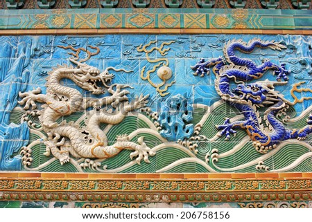 BEIJING - MAY 23: Nine-Dragon Wall (Jiulongbi) at Beihai park, on may 23, 2014, Beijing, China