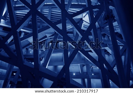 BEIJING - MAY 24: Beijing national stadium - the bird\'s nest local features at night, in the Beijing Olympic park, on may 24, 2014, Beijing, China