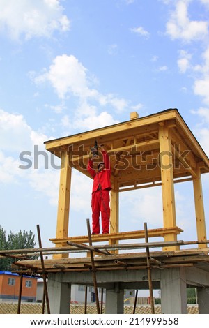 LUANNAN COUNTY - AUGUST 15: Construction workers to build water pavilion, on august 15, 2014, Luannan County, Hebei Province, China