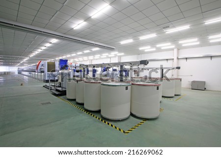 LUANNAN COUNTY - AUGUST 16: Spinning production line in a factory, on august 16, 2014, Luannan County, Hebei Province, China