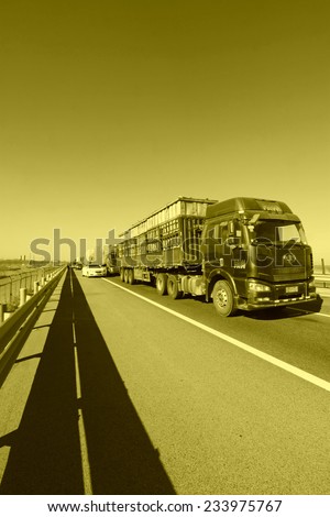 TIANJIN - DECEMBER 9: The heavy duty trucks were stopped on the highway Because of the traffic jam, on December 9, 2013, tianjin, China.