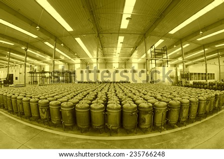 TANGSHAN - DECEMBER 22: The pressure tank put in a warehouse workshop, in a solar equipment production workshop on december 22, 2013, tangshan, china.