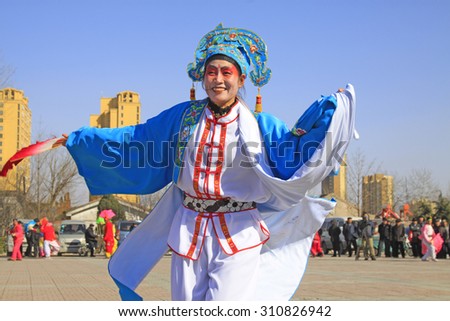 LUANNAN COUNTY - MARCH 3: traditional Chinese style yangko dance performances in the square, on march 3, 2015, Luannan County, Hebei province, China