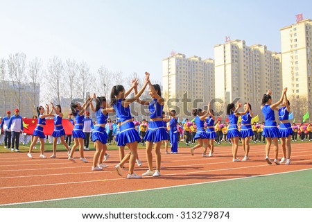 LUANNAN COUNTY - APRIL 14: Group gymnastic performance at the athletics meeting, April 14, 2015, Luannan County, Hebei Province, China