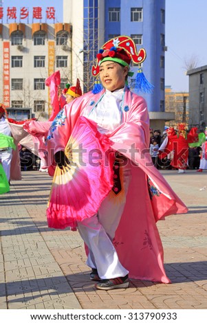 LUANNAN COUNTY - MARCH 1: traditional Chinese style yangko dance performances in the square, on march 1, 2015, Luannan County, Hebei province, China