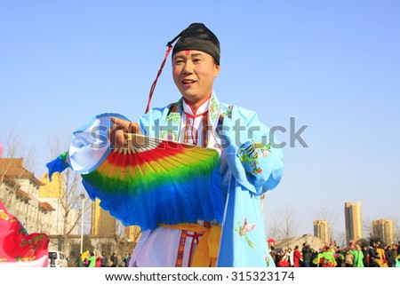 LUANNAN COUNTY - FEBRUARY 26: traditional Chinese style yangko dance performances in the square, on February 26, 2015, Luannan County, Hebei province, China