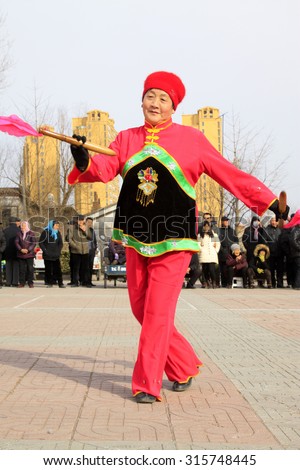 LUANNAN COUNTY - FEBRUARY 27: traditional Chinese style yangko dance performances in the square, on February 27, 2015, Luannan County, Hebei province, China
