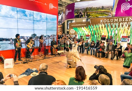BERLIN, GERMANY - MARCH 8, 2014: traditional folklore dance at Peru stand in the section 1.1 at ITB Travel Trade Show in the fairgrounds of Messe Berlin.