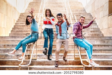 Similar – Image, Stock Photo Group of friends jumping and tossing ball up