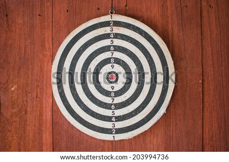dart board on classical wood wall