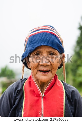 CHIANGMAI,THAILAND - SEP 17, 2014: Unidentified Palaung old woman in the Palaung traditional costume poses for the camera. Palaung people is a minority ethnic group living in northern Thailand