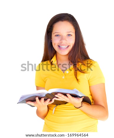 Teenage Girl Reading The Bible, isolated on white, white background, isolated on white background.