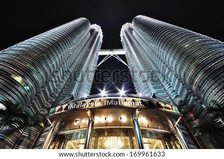 KUALA LUMPUR, MALAYSIA - OCTOBER 30: Petronas Twin Towers on October 30, 2010 in Kuala Lumpur, Malaysia. Its the world\'s tallest twin towers. The skyscraper height is 451.9m.