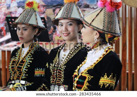KOTA KINABALU, MALAYSIA - MAY 30, 2015: Women of Kadazandusun ethnic in their traditional costumes during the State Harvest Festival Celebration in KDCA, Kota Kinabalu, Sabah.