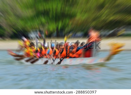 Dragon boat racing in motion blur