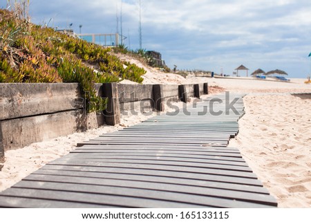 Close-up view of a wood board walk in the beach