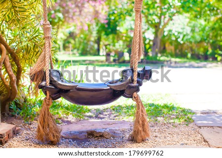 Close-up of a beautiful swing in the garden