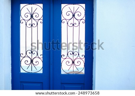 Typical blue door with stairs. Santorini island, Greece