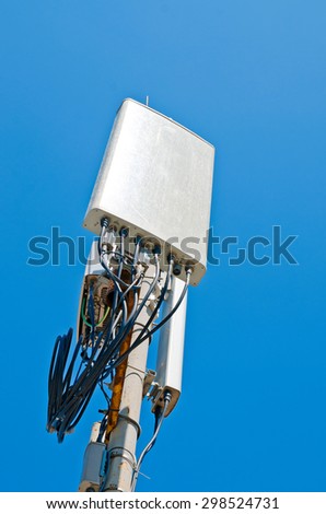 Antenna cellular base station against the blue sky