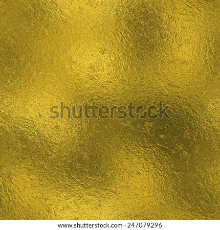 Golden Foil Seamless and Tileable Luxury background texture. Glittering holiday wrinkled gold background and shiny bright metal surface backdrop.