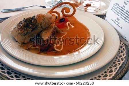 Delicious wedding food on white plate with menu