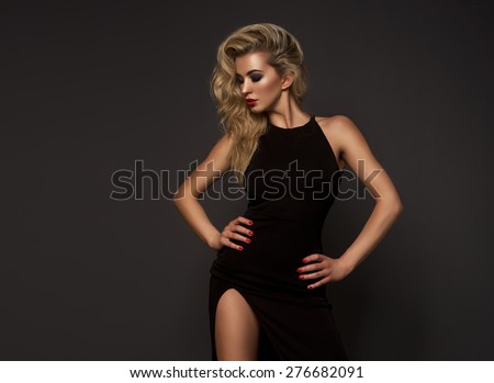 Cute blonde woman in gorgeous dress
