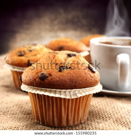 Similar – Foto Bild Schokoladenmuffins und Kaffeetasse auf dunklem Hintergrund