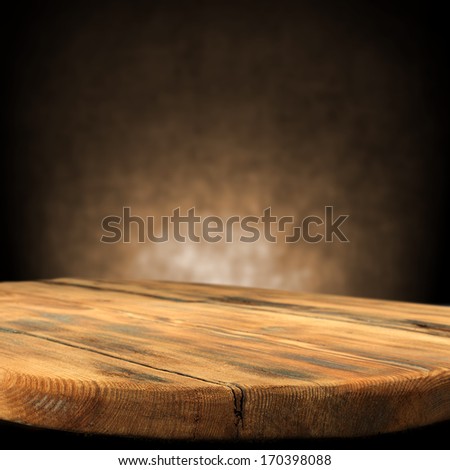 table and brown wall