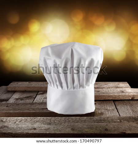 white cook hat on desk