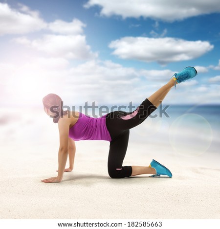 sexy woman and sport on sand