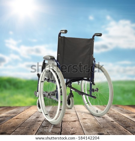 wheelchair and desk of wood