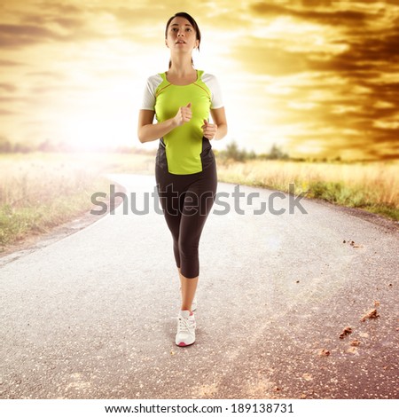 woman and sport on the road and sunset