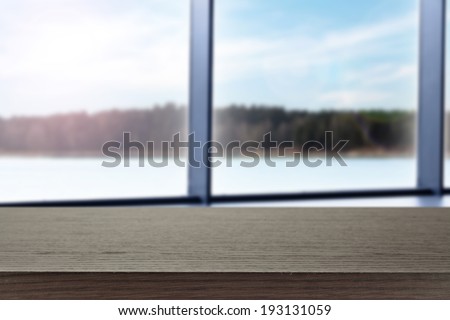 dark window sill and lake landscape