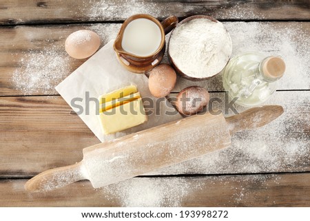butter eggs milk flour oil and kitchen desk of shabby chic
