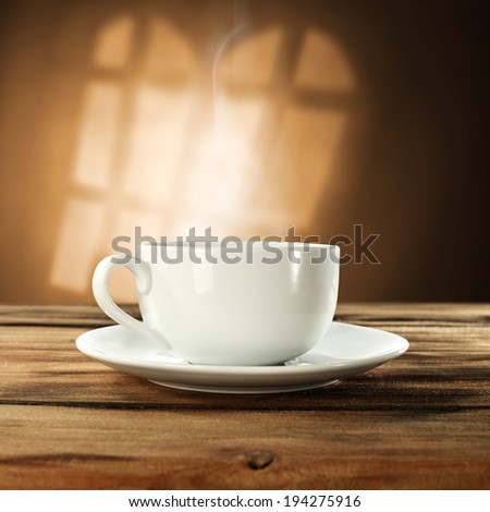 coffee cup with smoke and big window shadow