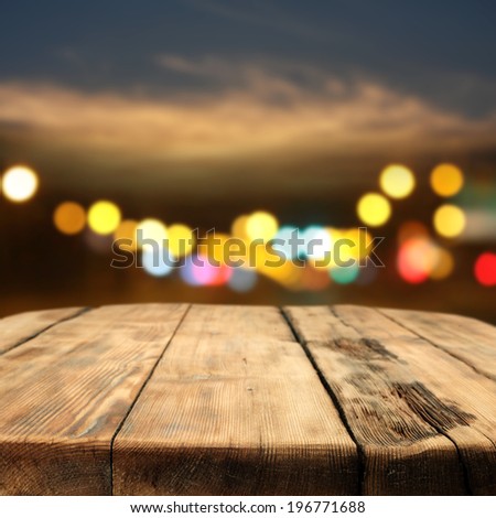 wooden vintage table night sky and lights